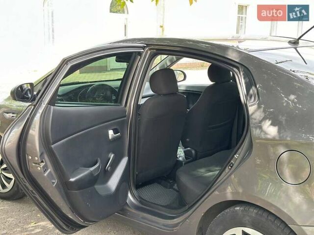 Серый Киа Рио, объемом двигателя 1.4 л и пробегом 190 тыс. км за 7100 $, фото 7 на Automoto.ua