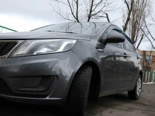 Серый Киа Рио, объемом двигателя 1.4 л и пробегом 141 тыс. км за 8500 $, фото 2 на Automoto.ua