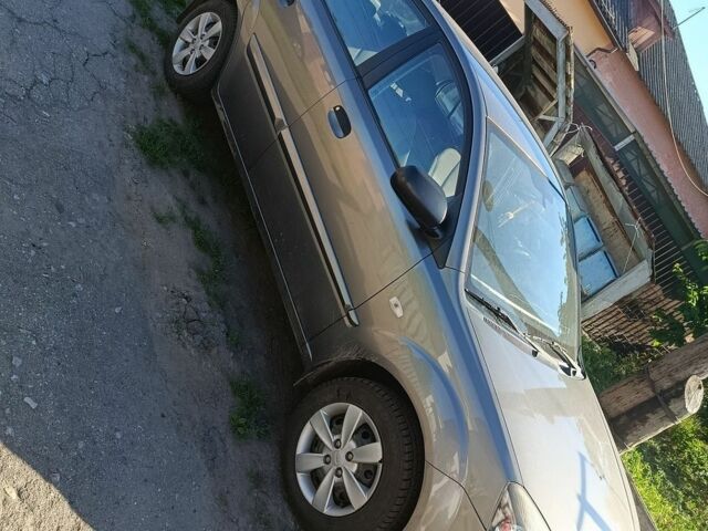 Сірий Кіа Ріо, об'ємом двигуна 1.4 л та пробігом 160 тис. км за 4800 $, фото 3 на Automoto.ua
