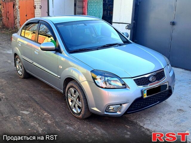 Серый Киа Рио, объемом двигателя 1.4 л и пробегом 174 тыс. км за 6000 $, фото 2 на Automoto.ua