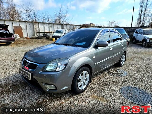 Сірий Кіа Ріо, об'ємом двигуна 1.4 л та пробігом 214 тис. км за 5700 $, фото 1 на Automoto.ua