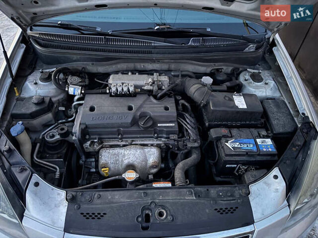 Серый Киа Рио, объемом двигателя 1.4 л и пробегом 228 тыс. км за 4550 $, фото 11 на Automoto.ua