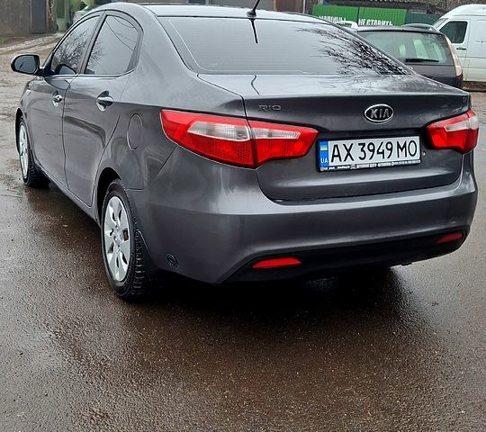 Серый Киа Рио, объемом двигателя 1.4 л и пробегом 243 тыс. км за 5700 $, фото 2 на Automoto.ua
