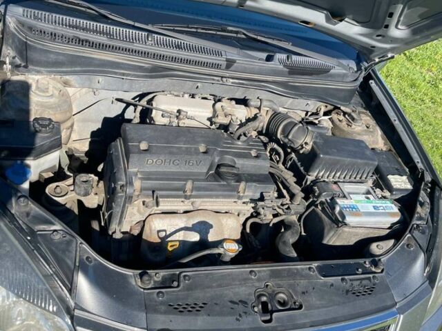 Сірий Кіа Ріо, об'ємом двигуна 1.4 л та пробігом 208 тис. км за 5400 $, фото 3 на Automoto.ua