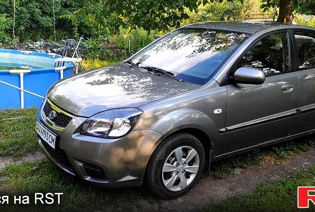 Серый Киа Рио, объемом двигателя 1.4 л и пробегом 215 тыс. км за 5200 $, фото 1 на Automoto.ua