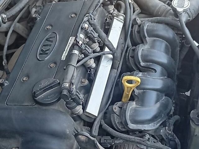 Серый Киа Рио, объемом двигателя 1.59 л и пробегом 300 тыс. км за 7100 $, фото 4 на Automoto.ua