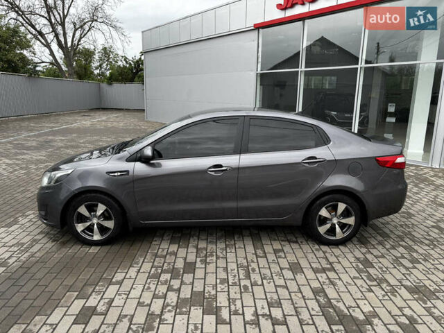Серый Киа Рио, объемом двигателя 1.4 л и пробегом 174 тыс. км за 6200 $, фото 3 на Automoto.ua