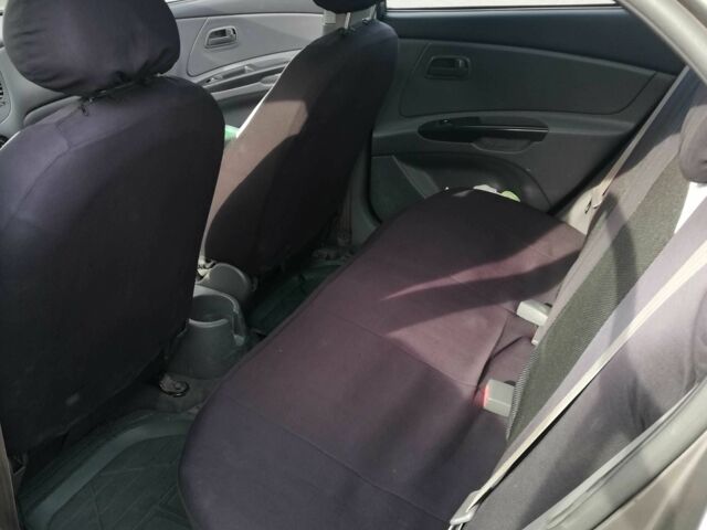 Серый Киа Рио, объемом двигателя 1.4 л и пробегом 140 тыс. км за 3951 $, фото 3 на Automoto.ua