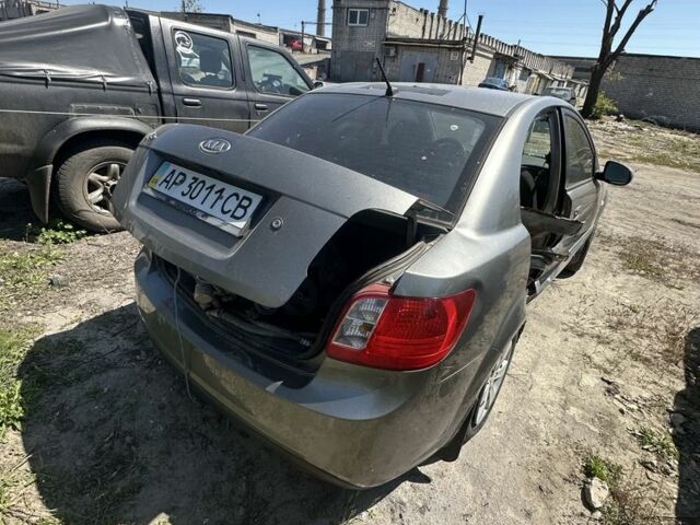Серый Киа Рио, объемом двигателя 1.4 л и пробегом 244 тыс. км за 1499 $, фото 3 на Automoto.ua