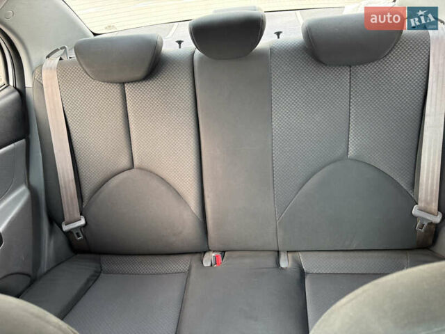 Серый Киа Рио, объемом двигателя 1.4 л и пробегом 167 тыс. км за 5800 $, фото 8 на Automoto.ua