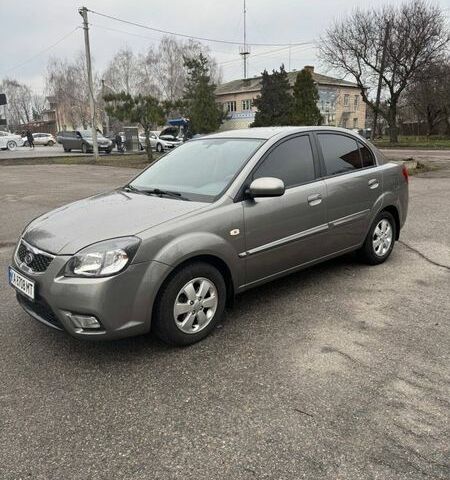 Серый Киа Рио, объемом двигателя 1.4 л и пробегом 135 тыс. км за 6999 $, фото 3 на Automoto.ua
