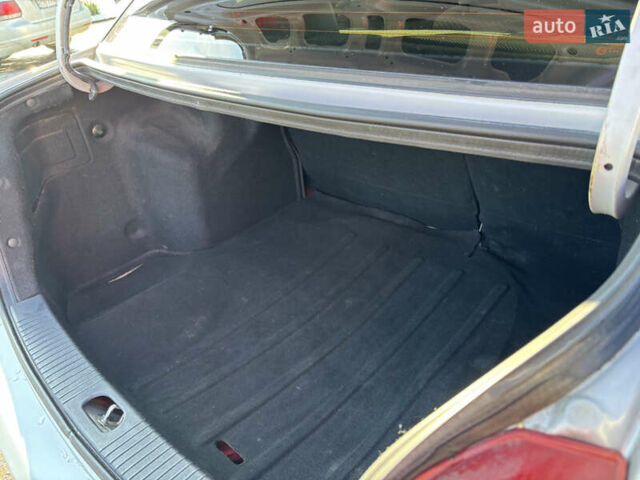 Серый Киа Рио, объемом двигателя 1.4 л и пробегом 138 тыс. км за 6000 $, фото 17 на Automoto.ua