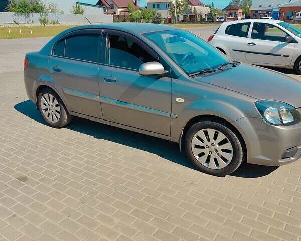 Сірий Кіа Ріо, об'ємом двигуна 0 л та пробігом 125 тис. км за 6199 $, фото 1 на Automoto.ua