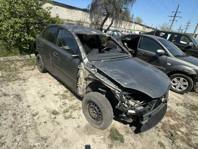 Серый Киа Рио, объемом двигателя 1.4 л и пробегом 244 тыс. км за 1499 $, фото 13 на Automoto.ua