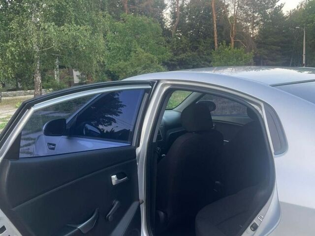 Сірий Кіа Ріо, об'ємом двигуна 1.4 л та пробігом 172 тис. км за 5600 $, фото 7 на Automoto.ua