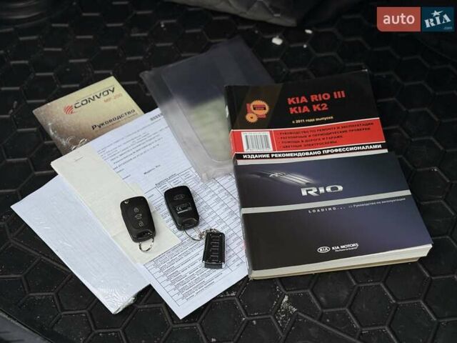 Серый Киа Рио, объемом двигателя 1.6 л и пробегом 180 тыс. км за 8950 $, фото 33 на Automoto.ua