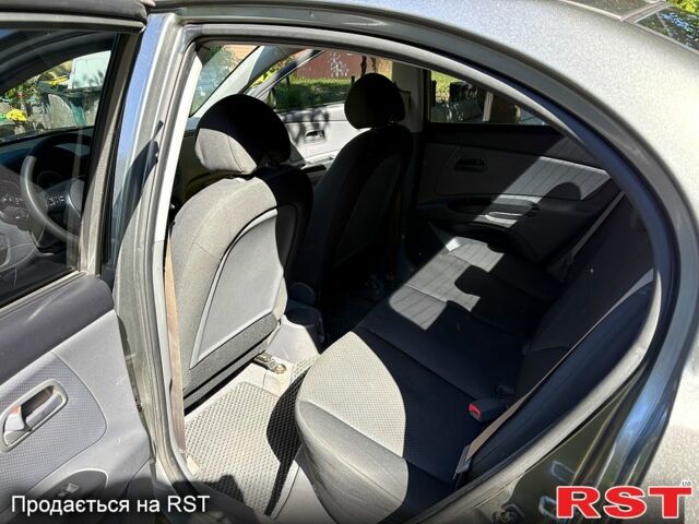 Сірий Кіа Ріо, об'ємом двигуна 1.4 л та пробігом 167 тис. км за 5400 $, фото 9 на Automoto.ua