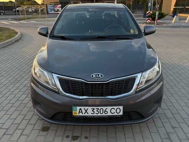 Серый Киа Рио, объемом двигателя 1.4 л и пробегом 117 тыс. км за 6600 $, фото 3 на Automoto.ua