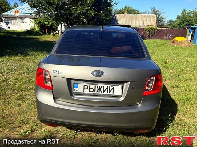 Сірий Кіа Ріо, об'ємом двигуна 1.4 л та пробігом 167 тис. км за 5400 $, фото 4 на Automoto.ua