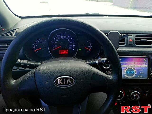 Сірий Кіа Ріо, об'ємом двигуна 1.4 л та пробігом 108 тис. км за 7300 $, фото 7 на Automoto.ua