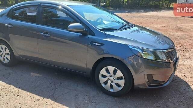 Серый Киа Рио, объемом двигателя 1.4 л и пробегом 156 тыс. км за 6600 $, фото 4 на Automoto.ua