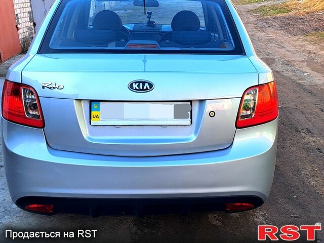 Серый Киа Рио, объемом двигателя 1.4 л и пробегом 174 тыс. км за 6000 $, фото 1 на Automoto.ua
