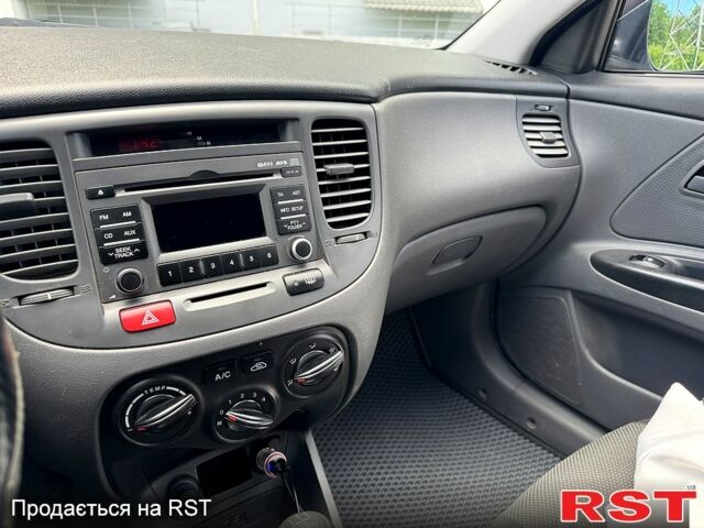 Серый Киа Рио, объемом двигателя 1.4 л и пробегом 170 тыс. км за 4999 $, фото 12 на Automoto.ua