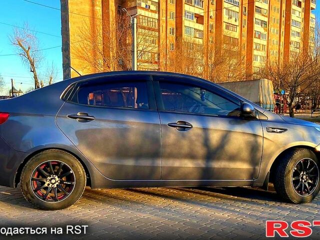 Серый Киа Рио, объемом двигателя 1.4 л и пробегом 152 тыс. км за 6950 $, фото 5 на Automoto.ua