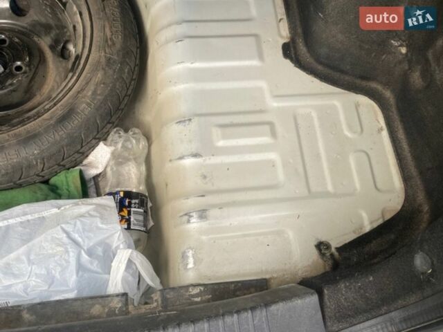 Серый Киа Рио, объемом двигателя 1.4 л и пробегом 154 тыс. км за 5300 $, фото 20 на Automoto.ua