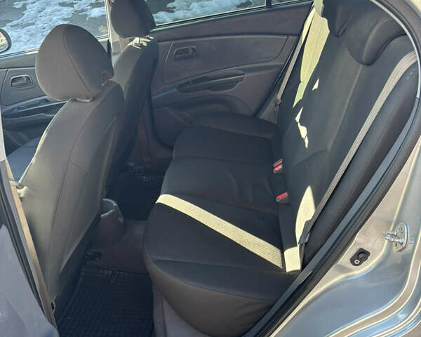 Серый Киа Рио, объемом двигателя 1.4 л и пробегом 138 тыс. км за 6000 $, фото 25 на Automoto.ua