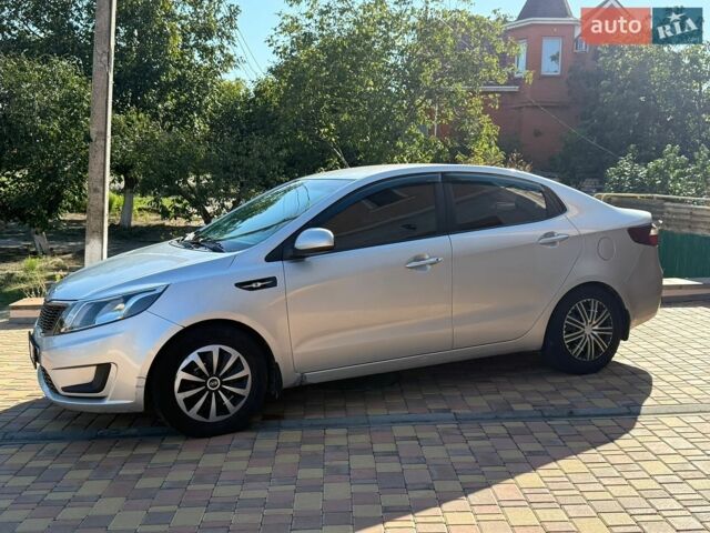 Сірий Кіа Ріо, об'ємом двигуна 1.4 л та пробігом 238 тис. км за 6200 $, фото 6 на Automoto.ua