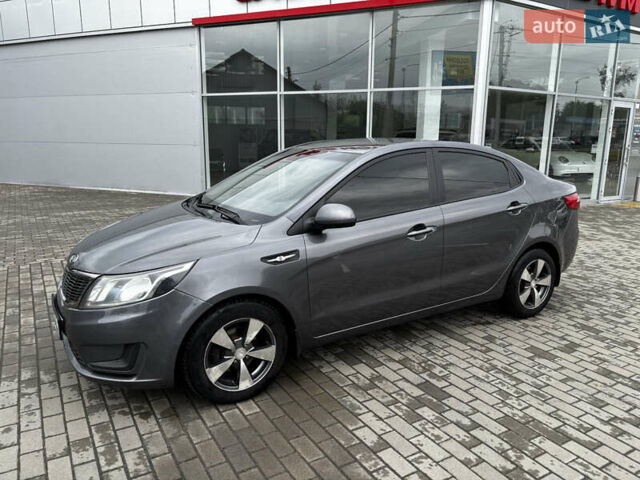 Серый Киа Рио, объемом двигателя 1.4 л и пробегом 174 тыс. км за 6200 $, фото 2 на Automoto.ua