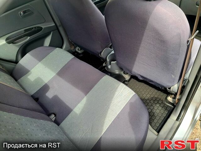 Серый Киа Рио, объемом двигателя 1.4 л и пробегом 174 тыс. км за 6000 $, фото 6 на Automoto.ua