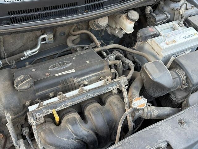 Серый Киа Рио, объемом двигателя 1.4 л и пробегом 117 тыс. км за 6600 $, фото 24 на Automoto.ua