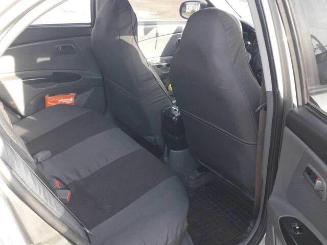 Серый Киа Рио, объемом двигателя 1.4 л и пробегом 153 тыс. км за 5500 $, фото 5 на Automoto.ua