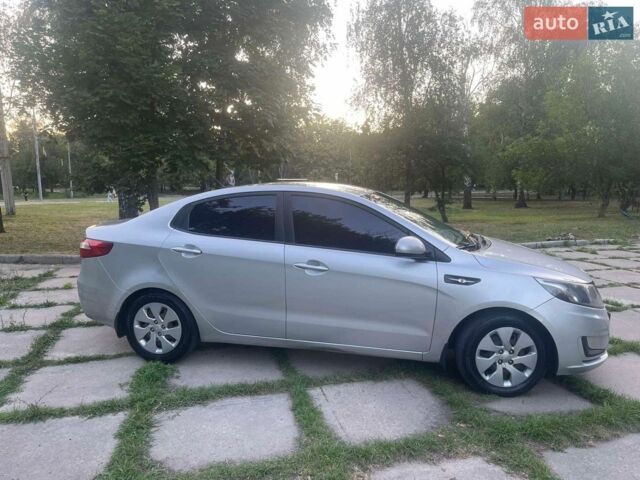 Сірий Кіа Ріо, об'ємом двигуна 1.4 л та пробігом 172 тис. км за 5600 $, фото 4 на Automoto.ua