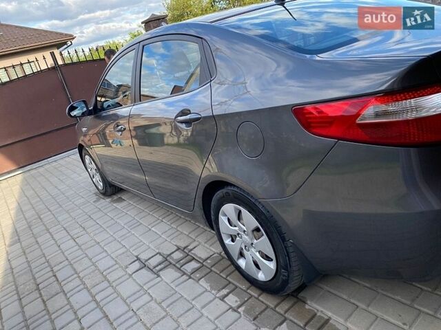 Сірий Кіа Ріо, об'ємом двигуна 1.4 л та пробігом 94 тис. км за 7600 $, фото 4 на Automoto.ua