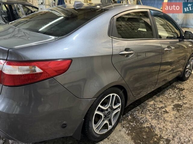 Серый Киа Рио, объемом двигателя 1.59 л и пробегом 262 тыс. км за 7000 $, фото 1 на Automoto.ua