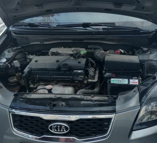 Сірий Кіа Ріо, об'ємом двигуна 1.4 л та пробігом 147 тис. км за 5500 $, фото 6 на Automoto.ua