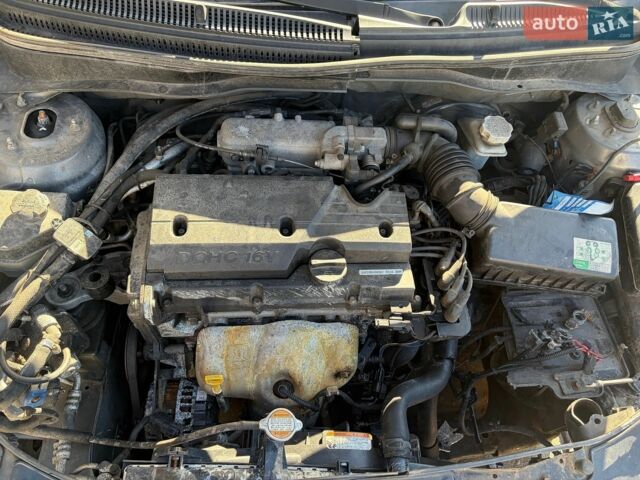 Сірий Кіа Ріо, об'ємом двигуна 1.4 л та пробігом 260 тис. км за 1500 $, фото 15 на Automoto.ua