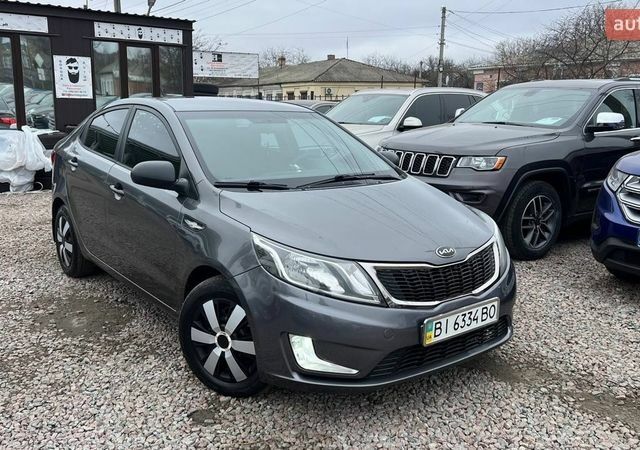 Сірий Кіа Ріо, об'ємом двигуна 1.4 л та пробігом 190 тис. км за 7500 $, фото 1 на Automoto.ua