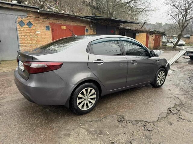 Сірий Кіа Ріо, об'ємом двигуна 1.4 л та пробігом 200 тис. км за 2850 $, фото 4 на Automoto.ua