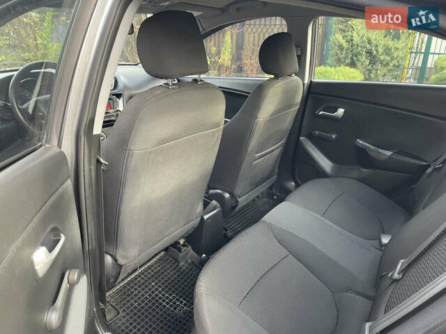 Серый Киа Рио, объемом двигателя 1.4 л и пробегом 167 тыс. км за 5999 $, фото 16 на Automoto.ua