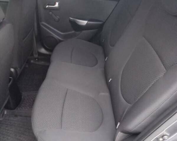 Серый Киа Рио, объемом двигателя 1.4 л и пробегом 100 тыс. км за 7700 $, фото 6 на Automoto.ua