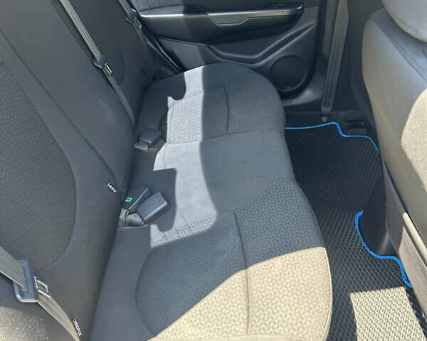 Серый Киа Рио, объемом двигателя 1.6 л и пробегом 250 тыс. км за 8299 $, фото 7 на Automoto.ua