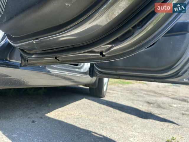 Серый Киа Рио, объемом двигателя 1.6 л и пробегом 250 тыс. км за 8299 $, фото 9 на Automoto.ua