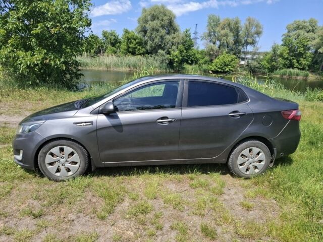 Сірий Кіа Ріо, об'ємом двигуна 1.4 л та пробігом 235 тис. км за 5800 $, фото 3 на Automoto.ua