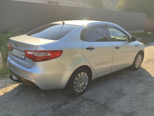 Сірий Кіа Ріо, об'ємом двигуна 1.4 л та пробігом 216 тис. км за 6802 $, фото 4 на Automoto.ua