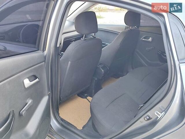 Серый Киа Рио, объемом двигателя 1.4 л и пробегом 225 тыс. км за 5200 $, фото 13 на Automoto.ua