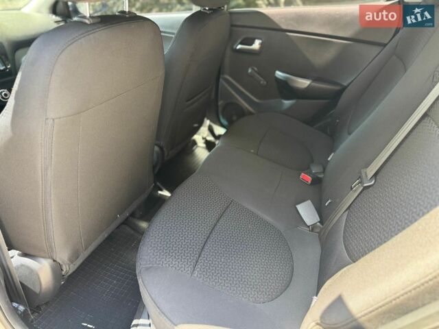 Сірий Кіа Ріо, об'ємом двигуна 1.4 л та пробігом 94 тис. км за 8799 $, фото 22 на Automoto.ua